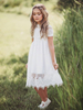 Robes cortège enfant ivoire en tulle col rond en dentelle longueur au dessus de genou robe fille de fleur