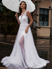 Robes de Mariée Bohème en Dentelles à Col Rond sans Manches avec Dos Transparents Creusants les Fleurs Coupe Cintrée Bas Evasée Unicolore