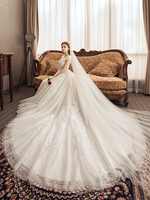 Robes de mariée en dentelle princesse robe de mariée ivoire col bijou manches robe de mariée avec le train