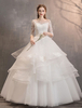 Robes de mariée en ivoire Tulle Illusion Décolleté Demi manche manches étage longueur Princesse Robe de mariée