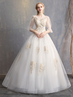 Robes de mariée princesse robe de bal dos nu demi manches illusion dentelle perlée robe de mariée maxi