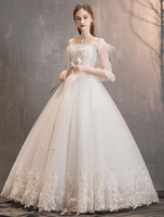 Robes de mariée princesse Tulle Ivoire sur la robe de mariée longueur de plancher dépaule
