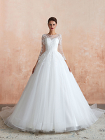 Robes de mariée trapèze blanche en tulle col rond manche longue en dentelle boutonné sur dos à traîne robe de mariage