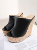 Sandales compensées noir en cuir synthétique Mules femme
