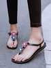 Sandales plates pour femmes avec des fleurs