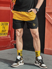 Shorts pour hommes Bloc de couleur Taille élastique Automne Shorts jaunes décontractés pour hommes