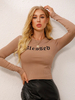Top T-shirt en Maille Taille Haute Court Femmes à Col rond avec Manches Longues Imprimé Les Mots Unicolore