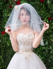 Voile de mariage plumes ivoire deux niveaux appliques tulle coupe bord classique voile de mariée