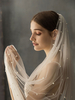 Voile de mariée décoré des perles