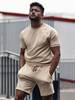 Vêtements de sport pour hommes 2 pièces à manches courtes et col bijou abricot clair